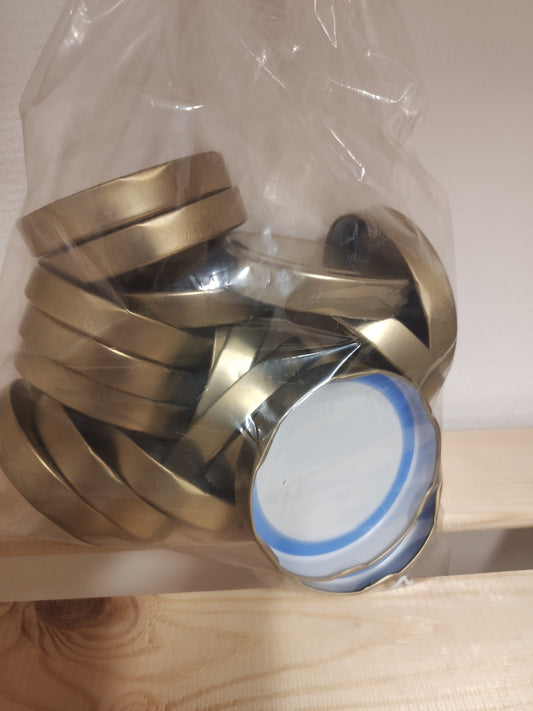 1 kasse a 24 runde glas ca. 380g/335ml med gylden låg