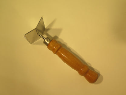 Værktøj til afrensning af dronning gitter eller andet